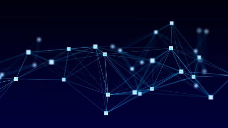 Abstract network of connected blue nodes representing information flow.